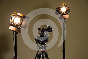 Camcorder and the two spotlights with Fresnel lenses