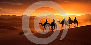 Camel caravan silhouette through the sand dunes in the Sahara Desert, Morocco