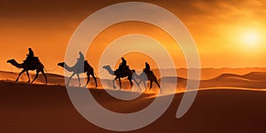 Camel caravan silhouette through the sand dunes in the Sahara Desert, Morocco