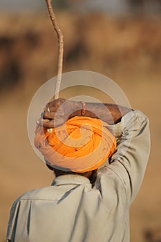Camel Herder in Orange Turban