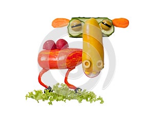 Camel made of fresh vegetables on isolated background