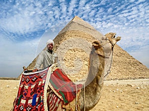 Camel Man in Front of Giza Pyramid, Cairo, Egypt