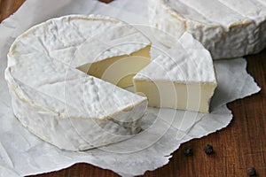 Camembert cheese. Farm products, rustic cheese.