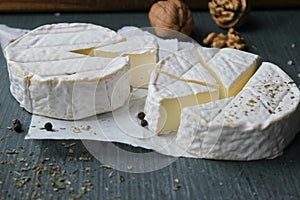 Camembert cheese. Farm products, rustic cheese.