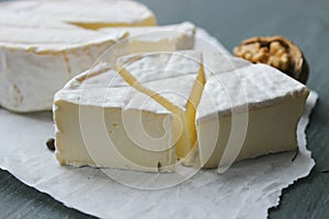 Camembert cheese. Farm products, rustic cheese.