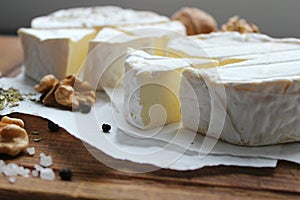 Camembert cheese. Farm products, rustic cheese.