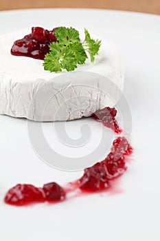 Camembert with cranberry jam photo