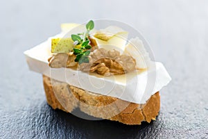 Camembert with nuts and pomegranate