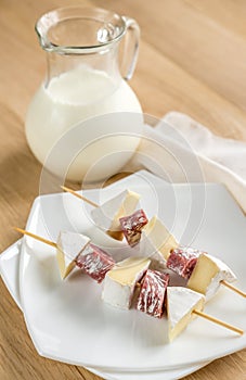 Camembert and salami skewers photo