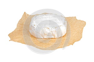 Camembert on a white background. Camembert cheese close-up on a white background