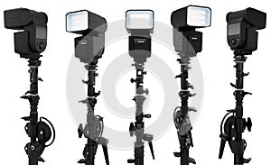 Camera external flash speedlight on stand isolated on white background.