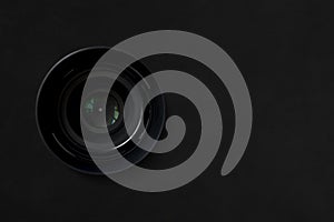 Camera lens in isolated on black background. copy space