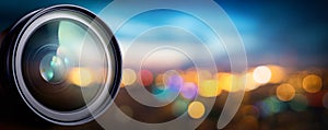 Camera lens with lens reflections. Media and technology concept background. photo