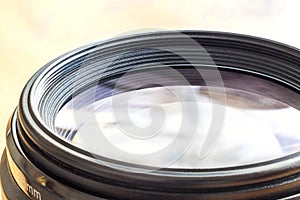 Camera lens with lense reflections. Closeup of a photographic le