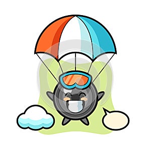 Camera lens mascot cartoon is skydiving with happy gesture