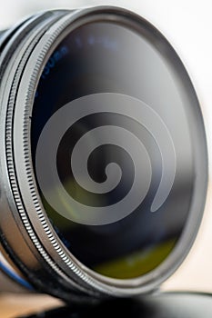 Camera lens with a polarizing filter