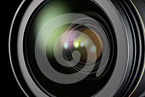 Camera lens reflecting light, capturing technology and photography