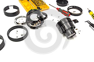 Camera lens repair on white background