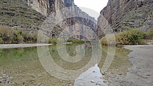 Camera Lifts Over Rio Grande And Santa Elena Canyon
