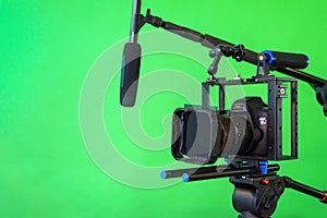 camera,microphone, lights and a green screen