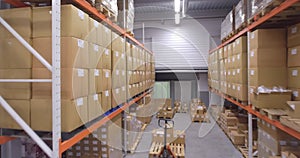 Camera moves up between warehouse racks