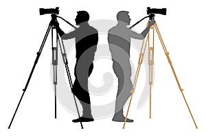 Camera operator on a tripod, photographer, cameraman silhouette.