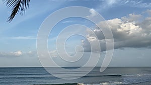 Camera pans beautiful landscape with a tropical sea on the beach in Thailand.