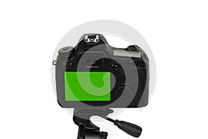 The camera placed on a tripod, isolated on a white