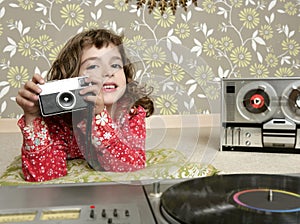 Camera retro photo little girl in vintage room