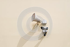 Camera security system and loudspeaker on the wall