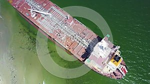 Camera Shows Aground Tanker from Deck House to Stern by Beach