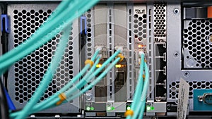 Camera shows cables plugged into powerful mining server at farm