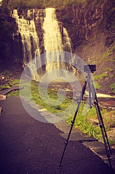 Camera and Skjervsfossen Waterfall, Norway