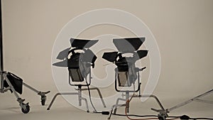 Camera spotlight in big studio.