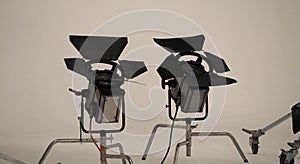 Camera spotlight in big studio.