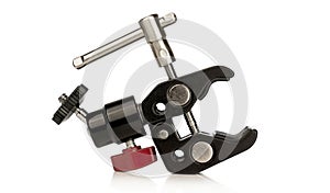 A camera stand clamp grip with a mini ball head joint