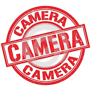 CAMERA text written on red stamp sign