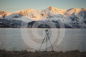 Camera and tripod in the Norwegian fjords