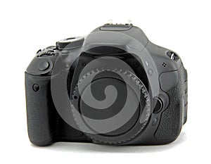 Camera on white background without lens. There is a black cap instead of the lens