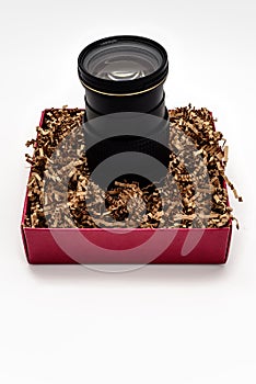 Camera zoom lens upright in gift box