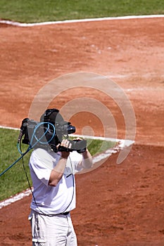 Cameraman on Baseball Field
