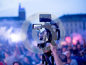 Cameraman broadcasting live tv and news from the city