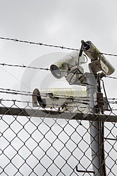 Cameras on top of security fence