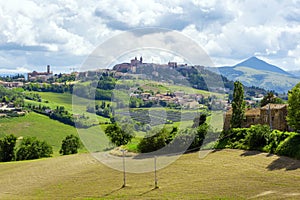 Camerino in Italy Marche over colourful fields photo