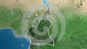 Cameroun border shape overlay. Glowed. Satellite.