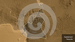 Cameroun border shape overlay. Outlined. Sepia elevation. Labels