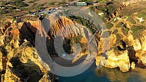 Camilo beach (Praia do Camilo) in Lagos, Algarve, Portugal. Wooden footbridge to the beach Praia do Camilo, Portugal