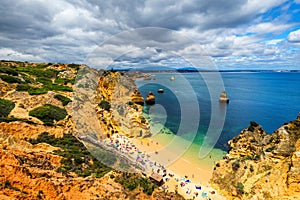 Camilo beach Praia do Camilo in Lagos, Algarve, Portugal. Wooden footbridge to the beach Praia do Camilo, Portugal. Picturesque