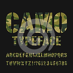 Camo alphabet typeface. Stencil type letters and numbers on a dark background.