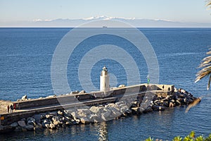 Camogli groyne and lighthouse. Color image